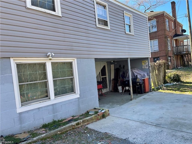 view of home's exterior featuring concrete block siding