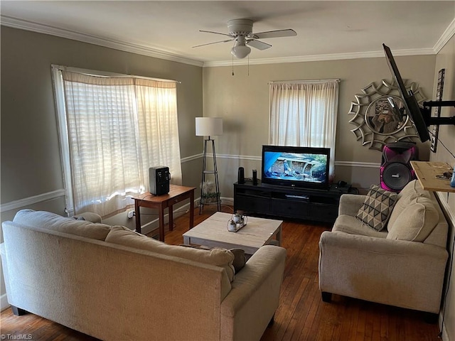 living room with hardwood / wood-style flooring, plenty of natural light, and ornamental molding