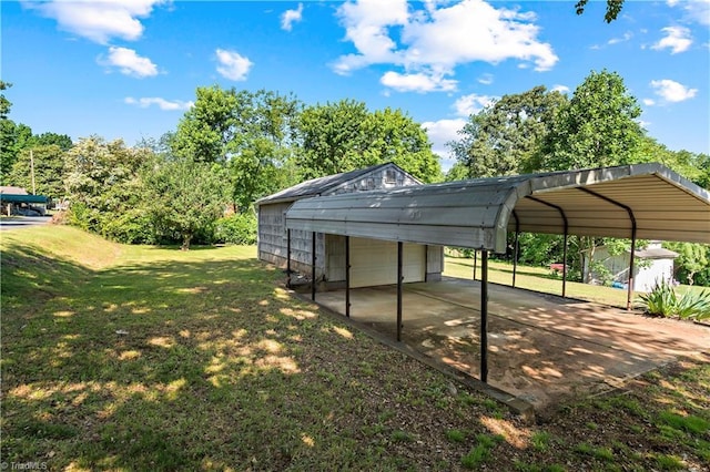 view of parking with a detached garage