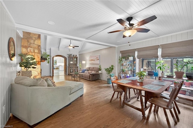1901 Runnymede Rd, Winston-Salem, NC 27104 - living area with ceiling fan, arched walkways, wood finished floors, and a wood ceiling with exposed beams