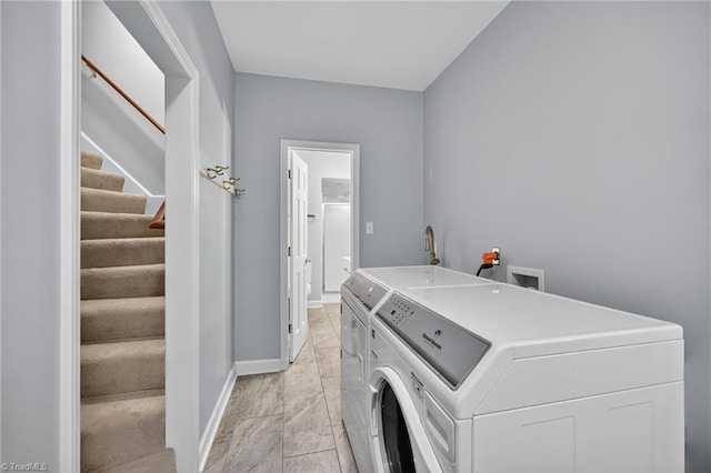 1901 Runnymede Rd, Winston-Salem, NC 27104 - laundry area with separate washer and dryer and light marble finish floors