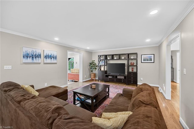 1901 Runnymede Rd, Winston-Salem, NC 27104 - living room with light wood-type flooring, ornamental molding, and recessed lighting