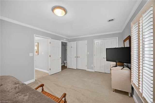 1901 Runnymede Rd, Winston-Salem, NC 27104 - interior space with multiple windows, carpet floors, multiple closets, and ornamental molding