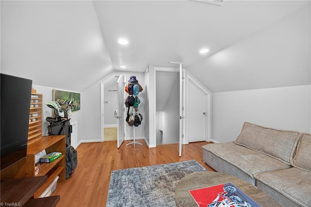 1901 Runnymede Rd, Winston-Salem, NC 27104 - living area featuring wood finished floors, recessed lighting, and vaulted ceiling