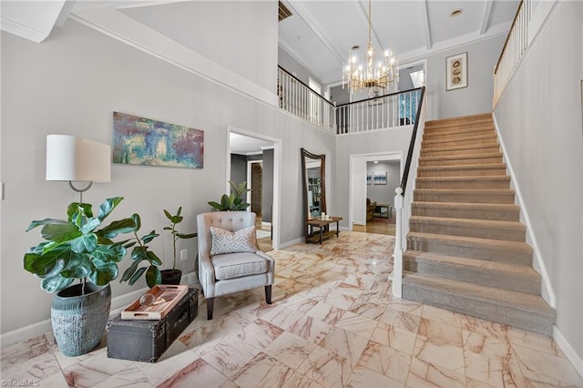 1901 Runnymede Rd, Winston-Salem, NC 27104 - foyer entrance featuring marble finish floors, stairs, a chandelier, a towering ceiling, and beam ceiling