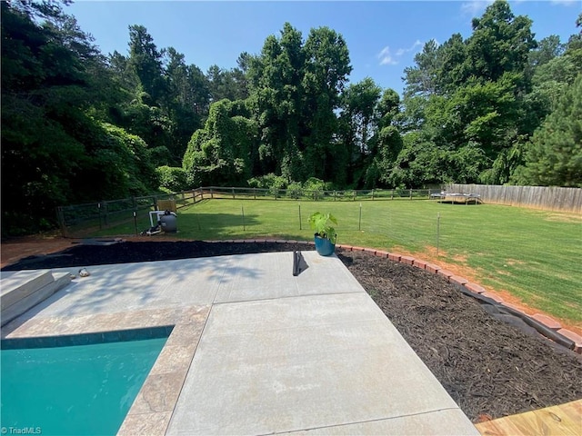 view of patio with a fenced in pool