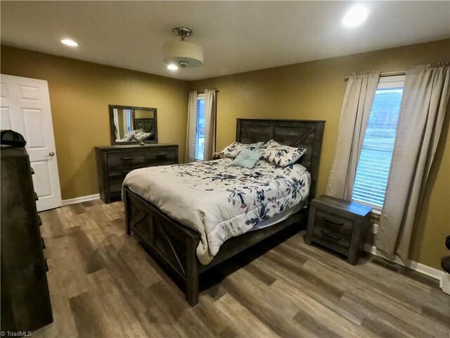 bedroom featuring hardwood / wood-style flooring