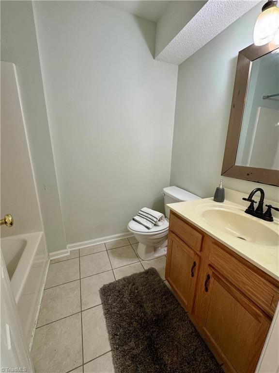 733 Rivertree Ln, Winston-Salem, NC 27103 - full bathroom with vanity, toilet, tile patterned flooring, and baseboards