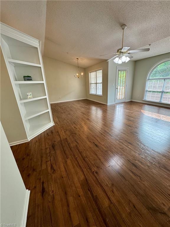 733 Rivertree Ln, Winston-Salem, NC 27103 - empty room with a textured ceiling, a chandelier, plenty of natural light, a ceiling fan, and wood finished floors