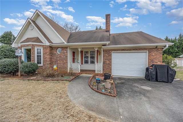 view of front of house with a garage and a front yard