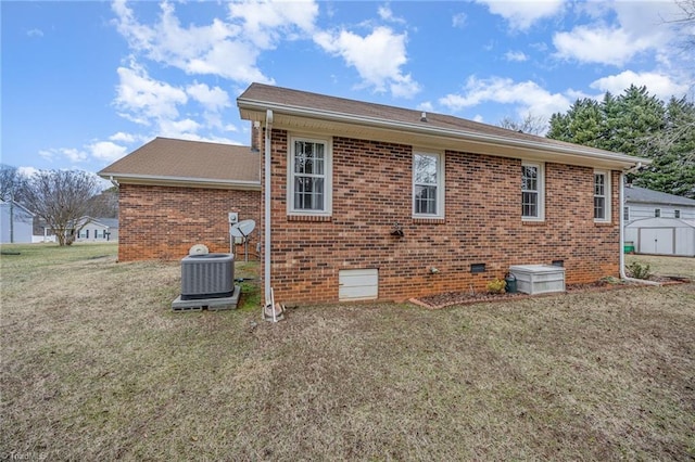 view of property exterior with cooling unit and a yard