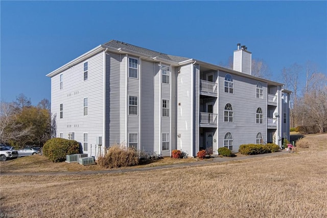 view of property featuring central AC unit