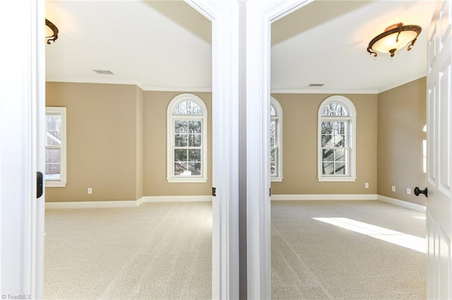 interior space with a wealth of natural light and crown molding