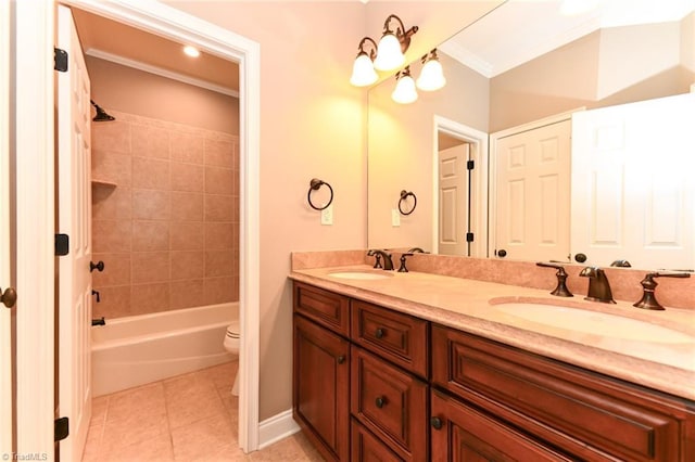 full bathroom with tiled shower / bath, tile patterned floors, vanity, toilet, and ornamental molding