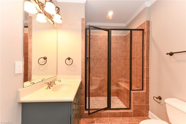 bathroom featuring a shower with shower door, vanity, toilet, and ornamental molding