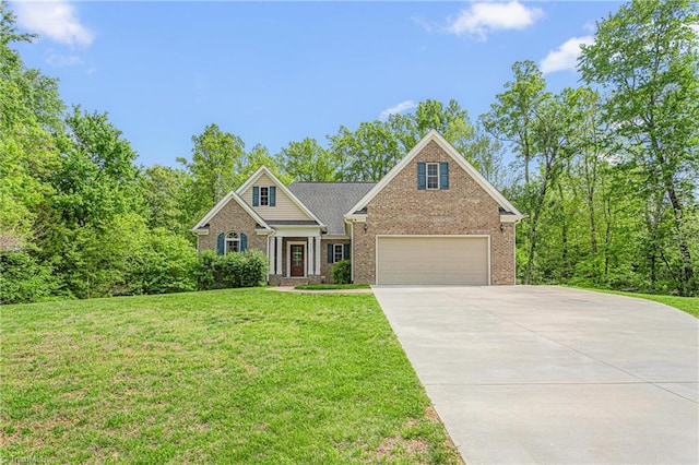 view of front facade with brick siding, a garage, driveway, and a front lawn
