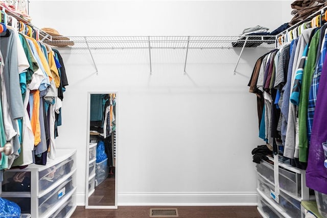 spacious closet with visible vents and wood finished floors