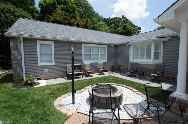 view of patio / terrace featuring a fire pit