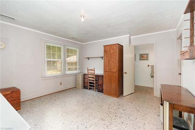 bedroom featuring ornamental molding, baseboards, and dark aggregate flooring
