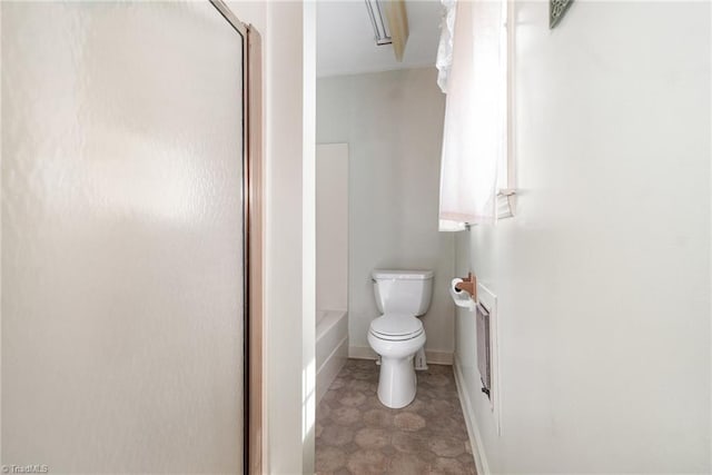 full bath featuring a shower, toilet, a bath, and baseboards