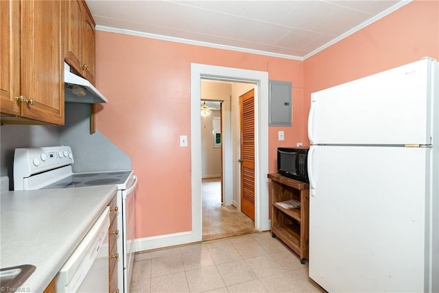 kitchen with white appliances, under cabinet range hood, electric panel, brown cabinetry, and ornamental molding