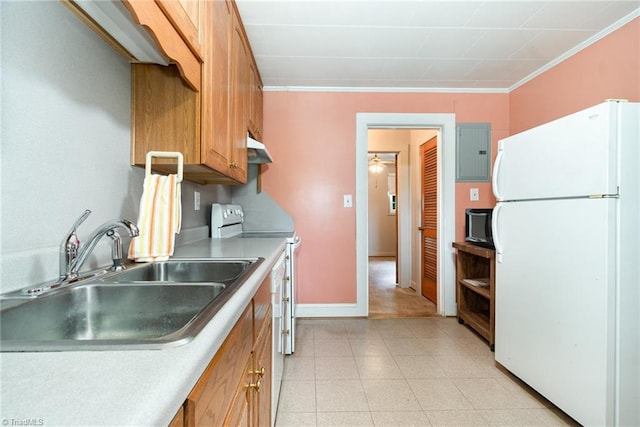 kitchen featuring freestanding refrigerator, electric range, a sink, electric panel, and under cabinet range hood