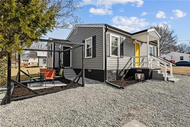 view of home's exterior with a patio