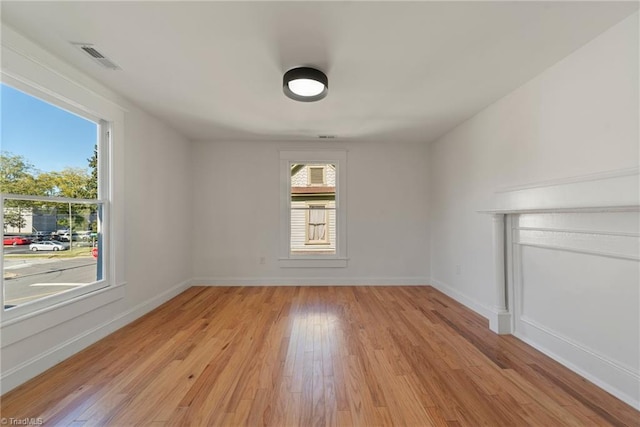 empty room with light wood-type flooring