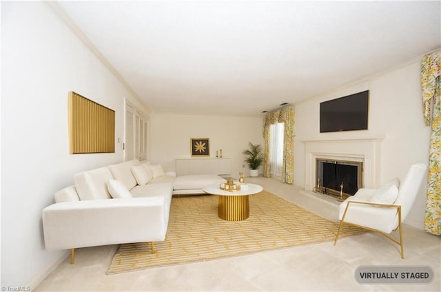 living room featuring carpet flooring and a fireplace with raised hearth