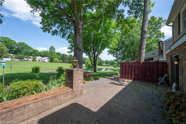 view of patio / terrace with a water view
