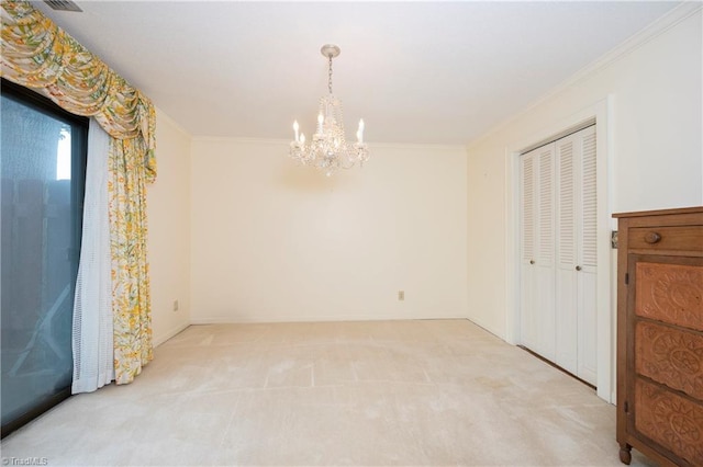 interior space with crown molding, a notable chandelier, and light carpet