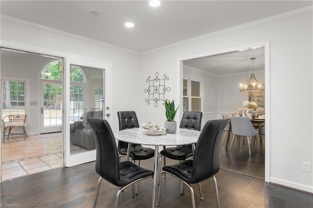 4105 Oak Hollow Dr, High Point, NC 27265 - dining space featuring ornamental molding, recessed lighting, french doors, wood finished floors, and a chandelier