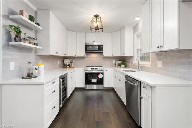 4105 Oak Hollow Dr, High Point, NC 27265 - kitchen featuring appliances with stainless steel finishes, beverage cooler, open shelves, and white cabinets