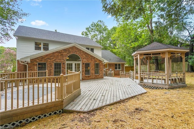 4105 Oak Hollow Dr, High Point, NC 27265 - rear view of property with a gazebo and brick siding
