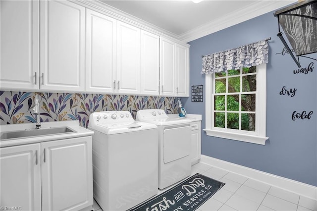 7672 Crossing Ridge Dr, Belews Creek, NC 27009 - washroom featuring cabinet space, independent washer and dryer, ornamental molding, and tile patterned flooring