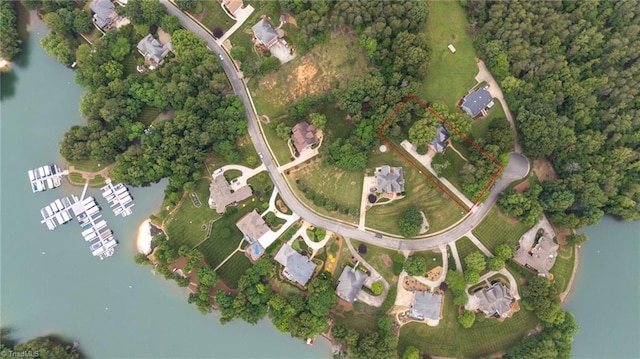 7672 Crossing Ridge Dr, Belews Creek, NC 27009 - aerial view of property's location with a large body of water and property parcel outlined
