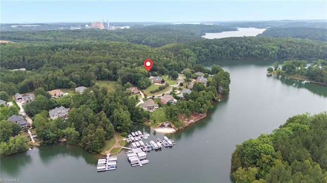 7672 Crossing Ridge Dr, Belews Creek, NC 27009 - aerial view of a heavily wooded area and a nearby body of water