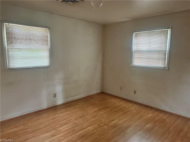 3815 Sheridan Rd, Greensboro, NC 27455 - empty room with light wood-type flooring and baseboards