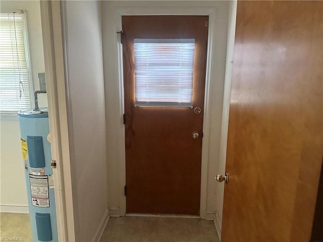 3815 Sheridan Rd, Greensboro, NC 27455 - hallway featuring water heater and baseboards