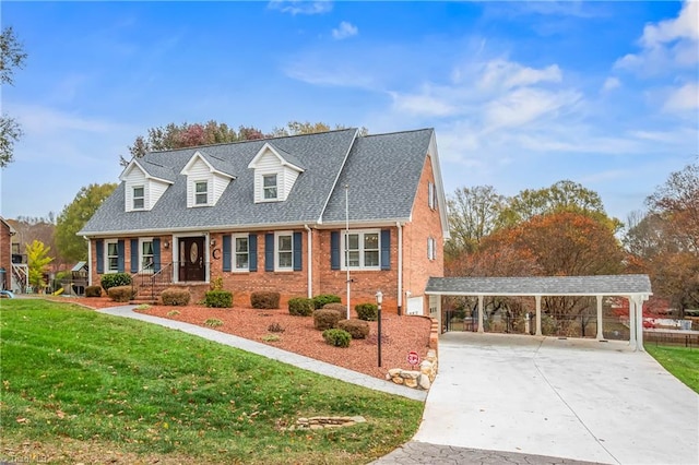 cape cod-style house with a front yard and a carport