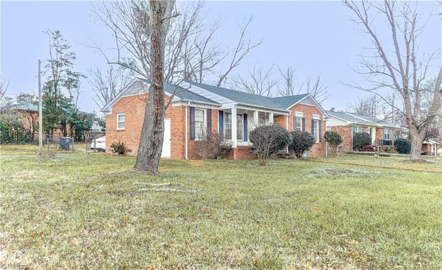 view of front of home with a front lawn