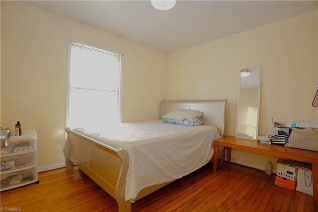 bedroom featuring hardwood / wood-style floors