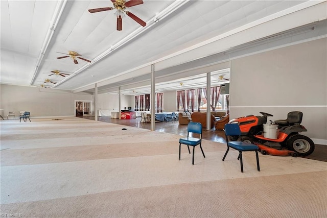 miscellaneous room featuring carpet flooring and ceiling fan