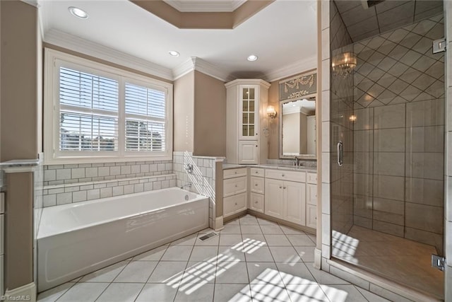 bathroom with ornamental molding, separate shower and tub, tile patterned flooring, and vanity