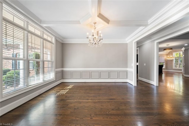 spare room with crown molding, beam ceiling, dark hardwood / wood-style floors, coffered ceiling, and a notable chandelier