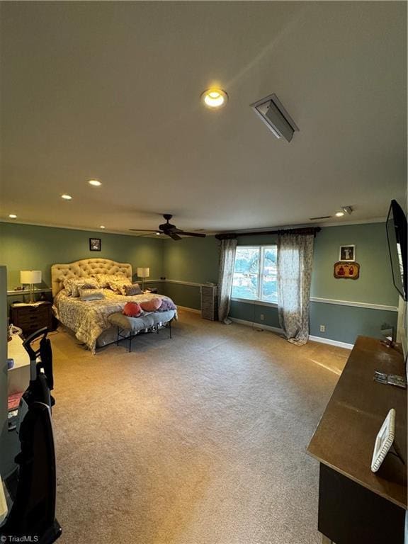 bedroom with ceiling fan and carpet floors