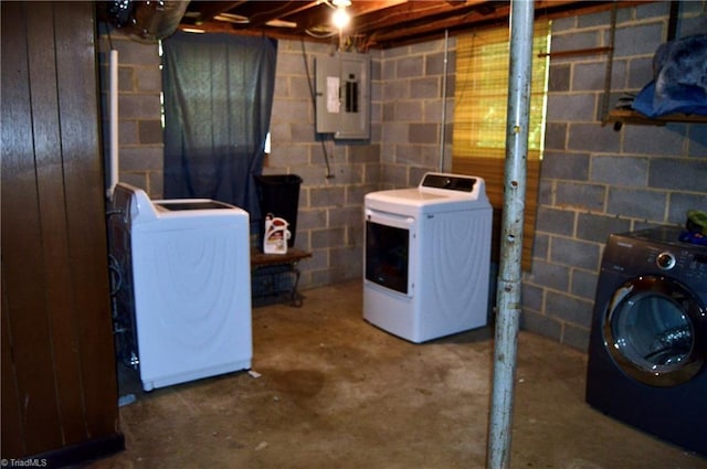 washroom with electric panel and independent washer and dryer