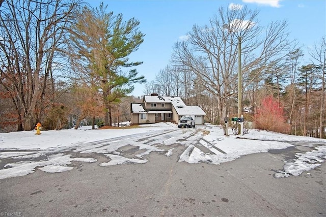 view of yard layered in snow