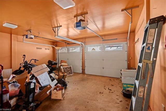 garage featuring a garage door opener