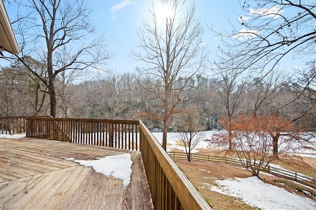 view of snow covered deck